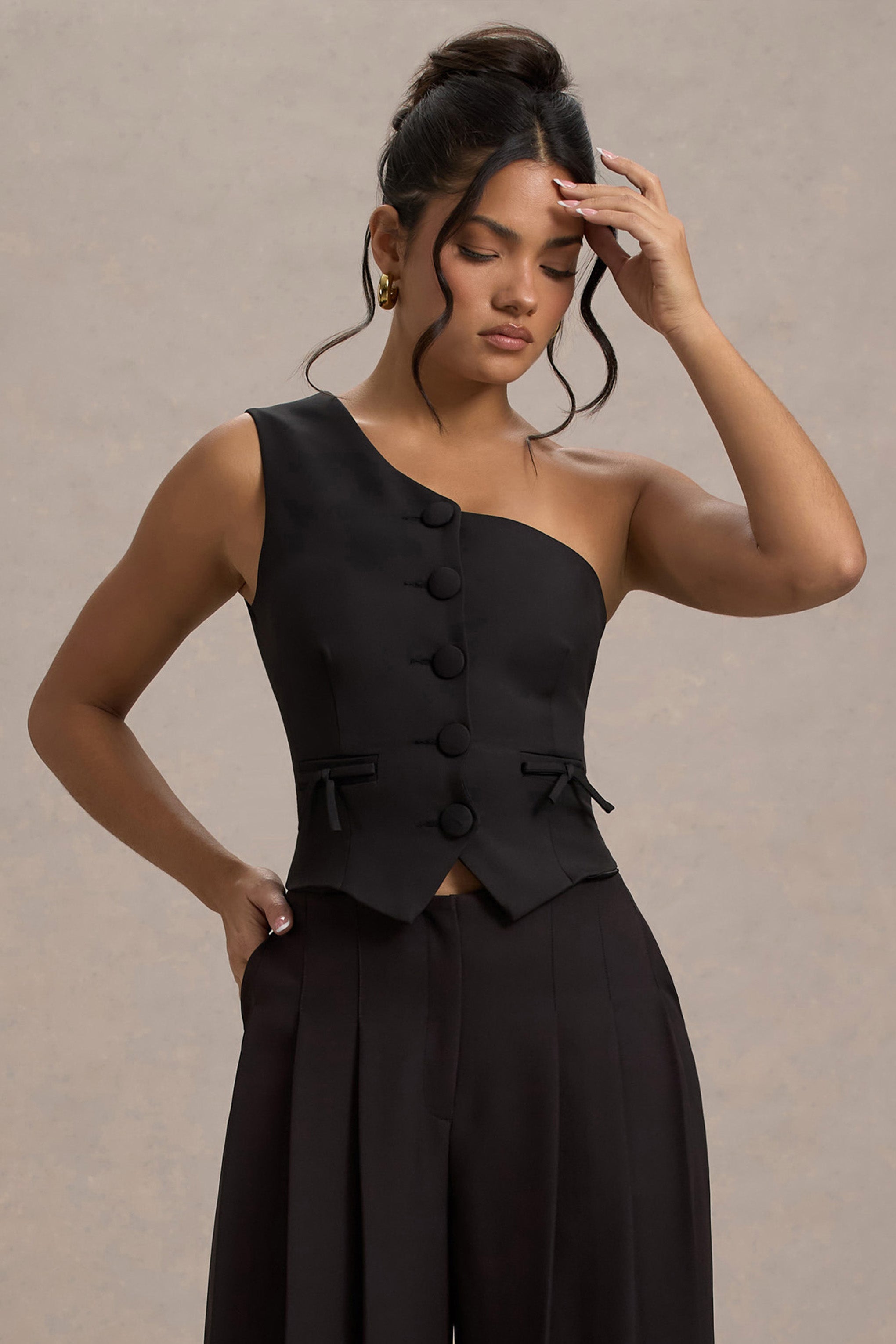 WB_HR_CL134935002-LeliaBlackOneShoulderTailoredTopWithBows_HR_CL134879002-GalileaBlackPlisseWide-LegTrousers2_a07c816f-3e01-48a5-8533-582844923470